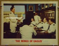 L827 WINGS OF EAGLES lobby card #3 '57 Wayne court martialed!