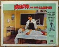 t254 MONSTER ON THE CAMPUS movie lobby card #7 '58 girl on lab table!