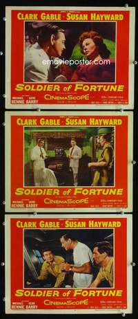 f469 SOLDIER OF FORTUNE 3 movie lobby cards '55 Clark Gable, Hayward