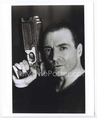 a063 ARMAND ASSANTE 8x10 movie still '90s close portrait w/big gun!