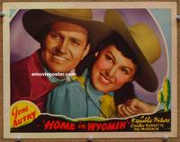 z465 HOME IN WYOMIN' movie lobby card '42 great close up of Gene Autry & Fay McKenzie!