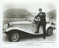 1b200 MOONRAKER 8x10 still '79 Roger Moore as James Bond in Rio de Janeiro posing by MP sports car!