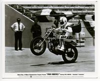1b327 VIVA KNIEVEL 8x10 movie still '77 daredevil Evel Knievel doing a wheelie on his motorcycle!
