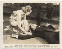2d091 GIGOLETTE 8x10.25 movie still '35 sexy Adrienne Ames kneels over unconscious man on floor!