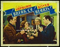 3b295 BREAK OF HEARTS LC '35 Charles Boyer toasts Katharine Hepburn with champagne & flowers!