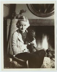 3m043 BETTE DAVIS 8x10 still '30s wonderful seated portrait by fireplace holding Scottish Terrier!
