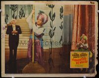 4c017 A-HAUNTING WE WILL GO lobby card '42 cool image of Hardy doing Indian rope trick with Laurel!