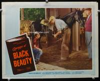 4c122 COURAGE OF BLACK BEAUTY lobby card #4 '57 Johnny Crawford, cool image of horse in stable!