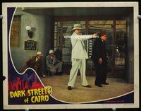 4c138 DARK STREETS OF CAIRO lobby card '40 Sigrid Gurie, great image of shootout in front of bank!