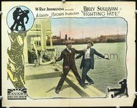 4c188 FIGHTING FATE lobby card '25 boxer Billy Sullivan about to knock bad guy off pier into water!