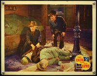 4c421 LION & THE LAMB lobby card '31 shifty looking villains take wallets from unconscious men!