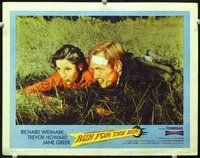 4c679 RUN FOR THE SUN movie lobby card #5 '56 Richard Widmark & Jane Greer laying in grass!