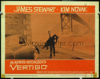 4c923 VERTIGO LC #7 '58 Alfred Hitchcock, James Stewart holds unconscious Kim Novak under bridge!