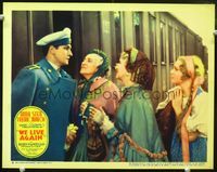 4c941 WE LIVE AGAIN movie lobby card '34 pretty Anna Sten sees soldier Fredric March off!