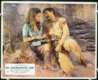 4e632 PROFESSIONALS German movie lobby card '66 Claudia Cardinale, wounded Jack Palance!