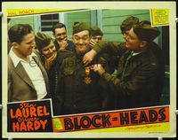 4f464 BLOCK-HEADS LC '38 Stan Laurel is given medal for doing his duty for 20 years after the war!