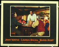 4f469 BLOOD ALLEY lobby card #4 '55 John Wayne talks to older man at table as Lauren Bacall watches!