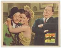 4f489 BULLFIGHTERS lobby card '45 pretty Margo Woode hugs Stan Laurel as Oliver Hardy disapproves!