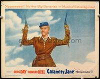4f496 CALAMITY JANE LC '53 best close up of Doris Day in buckskin pointing both guns in the air!