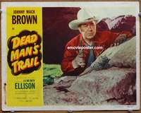 4f540 DEAD MAN'S TRAIL LC '52 close up of Johnny Mack Brown crouching behind rock with gun in hand!