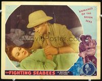 4f574 FIGHTING SEABEES LC '44 close up of John Wayne in pith helmet leaning over Susan Hayward!