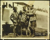 4f579 FLYING ACE LC '26 c/u of aviator Steve Reynolds with his peg leg by airplane with 2 others!