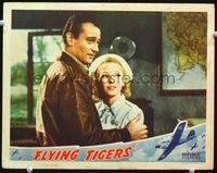 4f582 FLYING TIGERS lobby card '42 great close up of pilot John Wayne holding pretty nurse Anna Lee!