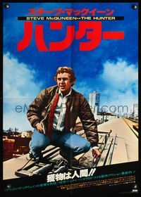 4v225 HUNTER Japanese '80 stylized image of bounty hunter Steve McQueen on top of train!
