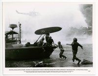 5j034 APOCALYPSE NOW 8x10.25 still '79 soldiers on boat under fire getting out surfboards!