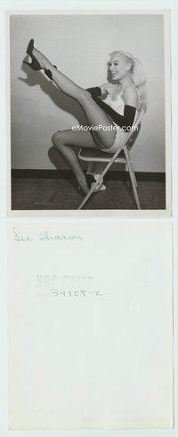 5j523 SHARON LEE 7.25x9 still '50s sitting on folding chair holding up fishnet stocking leg!