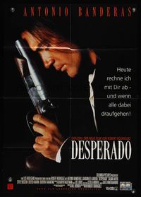 6d598 DESPERADO video German '95 Robert Rodriguez, close image of Antonio Banderas with big gun!