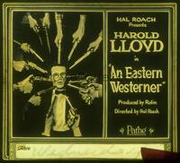 7j025 EASTERN WESTERNER glass slide '20 c/u of Harold Lloyd with 12 guns pointed at his head!