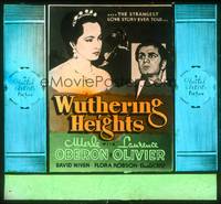 7j066 WUTHERING HEIGHTS glass slide '39 Laurence Olivier is torn with desire for Merle Oberon!