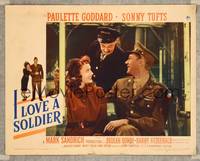 7r397 I LOVE A SOLDIER LC #3 '44 Sonny Tufts & Paulette Goddard sit together on bench!