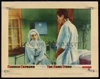 7r584 NUN'S STORY LC #8 '59 close up of religious missionary Audrey Hepburn in habit & Peter Finch
