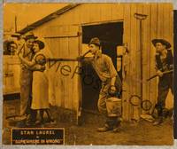 7r716 SOMEWHERE IN WRONG LC '25 hillbilly Stan Laurel holding bucket standing outside barn!