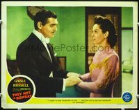 7r769 THEY MET IN BOMBAY LC '41 suave Clark Gable tells Rosalind Russell he can't arrest her!