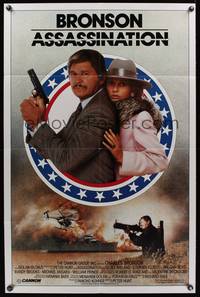 7y052 ASSASSINATION 1sh '86 close-up of Charles Bronson with Jill Ireland, rocket launcher!