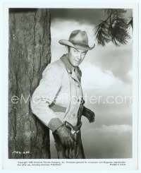 9g128 FAR COUNTRY 8x10 still '55 close up of James Stewart standing by tree about to draw guns!