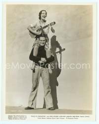 9g375 ROAD TO SINGAPORE candid 8x10 still '40 wacky Dorothy Lamour on Hope's shoulders with guitar!