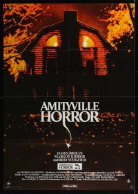 9j126 AMITYVILLE HORROR German '79 AIP, great image of haunted house, for God's sake get out!