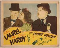 9k242 FLYING DEUCES LC '39 Jean Parker romances Stan Laurel as Oliver Hardy watches!