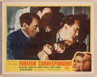 9k247 FOREIGN CORRESPONDENT LC #2 R48 Hitchcock, close up of George Sanders being restrained!