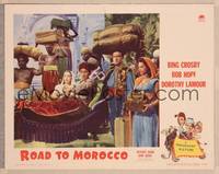 9k402 ROAD TO MOROCCO LC '42 Bob Hope is porter for Bing Crosby & Dorothy Lamour in sedan chair!