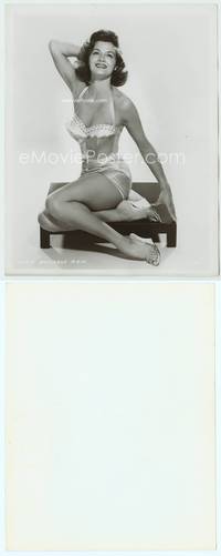 9y020 ANGIE DICKINSON 8x10 still '50s sitting on low table in sexiest cheesecake pose!