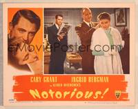 1d422 NOTORIOUS LC #8 '46 Cary Grant reads while Calhern puts necklace on Ingrid Bergman!