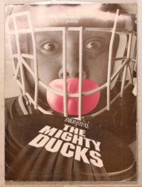 1j216 MIGHTY DUCKS presskit '92 great image of puck coming at goalie, ice hockey!