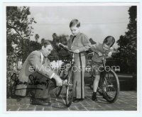 2x009 CARBINE WILLIAMS signed deluxe candid 8x10 still '52 by James Stewart, who's helping step-sons