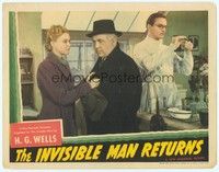 3a208 INVISIBLE MAN RETURNS LC '40 Nan Grey holds Cecil Kellaway while John Sutton works in lab!