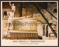3d248 ANDY WARHOL'S FRANKENSTEIN LC #7 '74 Paul Morrissey, Udo Kier lowers naked girl into tank!